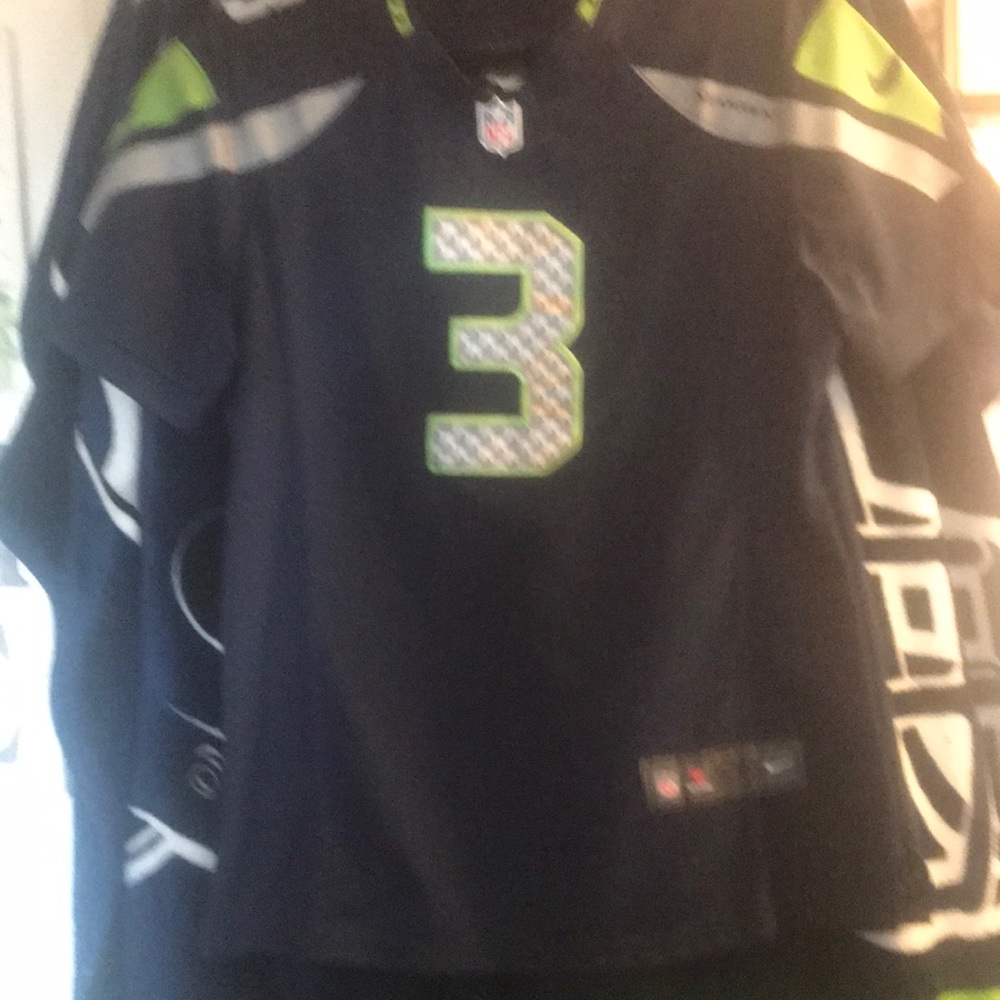 Russell Wilson #3 Good shape no holes or tears. V-neck